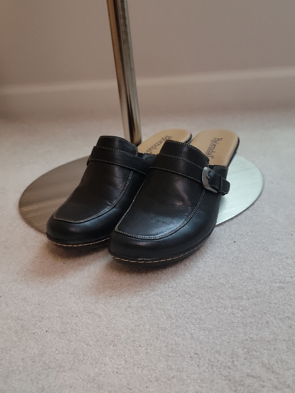 Black leather mules by Bjorndal